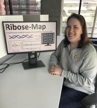 Figure legend
Georgia Tech Bioinformatics PhD student, Alli Gombolay, with a graphical representation of the input/output of the Ribose-Map toolkit.
 (click image to view larger)