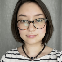 photo of woman with short brown hair and glasses